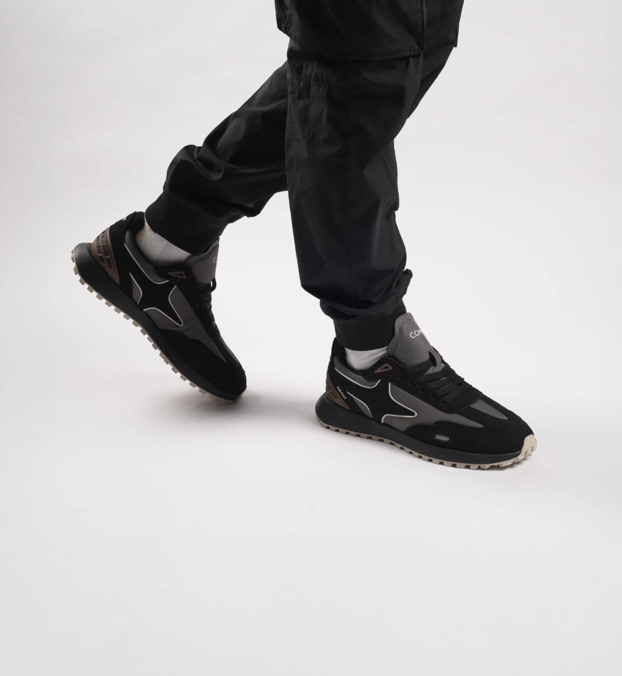 Comet Eclipse sneakers in a black and grey colorway